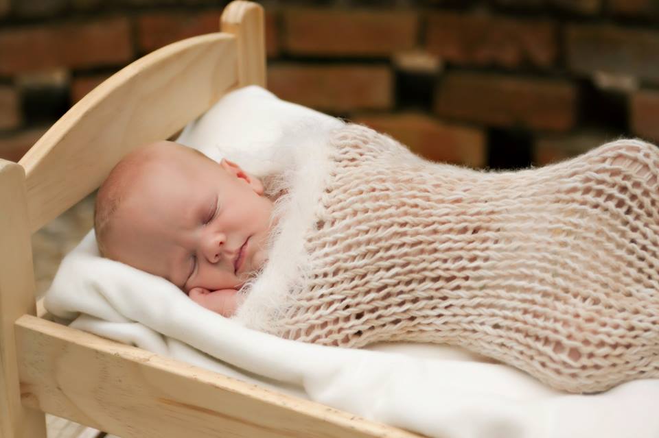 baby in cradle