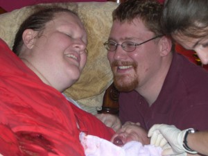 elation holding baby born natural VBAC at home after two cesareans