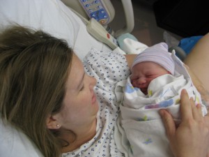Mom examining her hospital VBAC baby boy