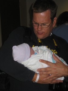 Daddy David cuddling his new son born VBAC at Denton Presbyterian