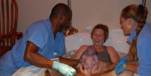 Dr. Cummings waterbirth VBAC Denton Presbyterian hospital elated mother and newborn baby